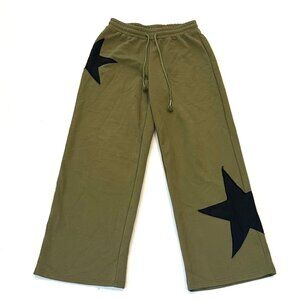 green wide leg sweats w/ black star design